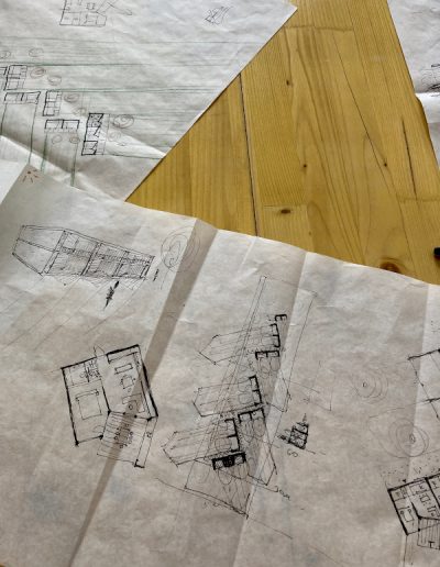 paper blueprints on desk