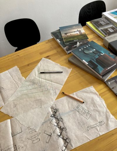 paper blueprints on desk